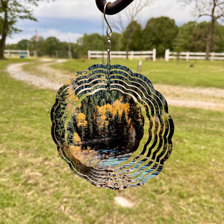 Wind Spinner Bridge Across Aminas River in Fall